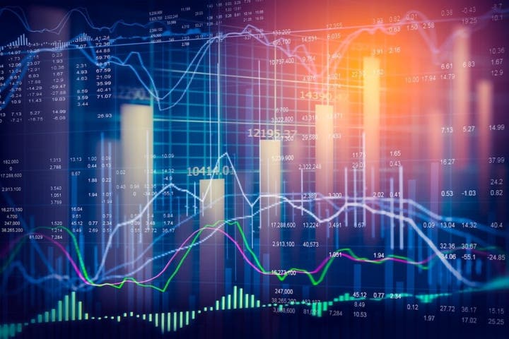 "Abstract financial graph with multiple line and bar charts, displaying various data points and trends against a dark blue background, highlighted by warm light in the top right corner."