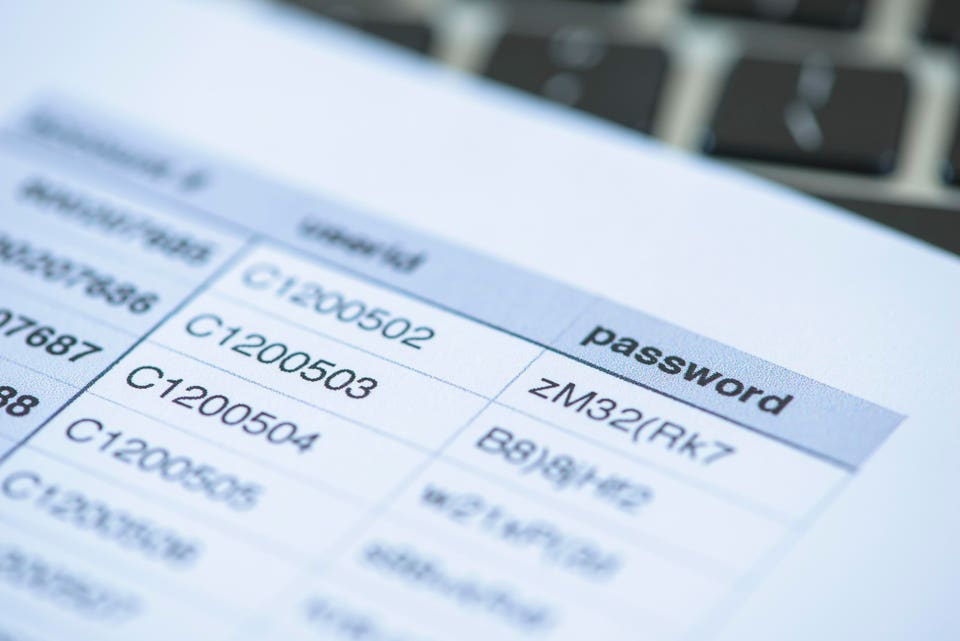 "Printed table displaying user IDs and passwords, with a prominent 'password' column header."