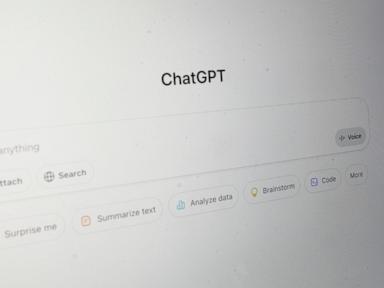 ChatGPT user interface with a search bar and buttons like "Summarize text," "Analyze data," and "Brainstorm."