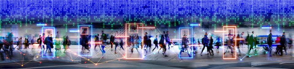 "Blurred crowd of people in motion with digital data flowing overhead, glowing neon rectangles highlighting individuals, and connecting network lines, representing AI analysis or surveillance."